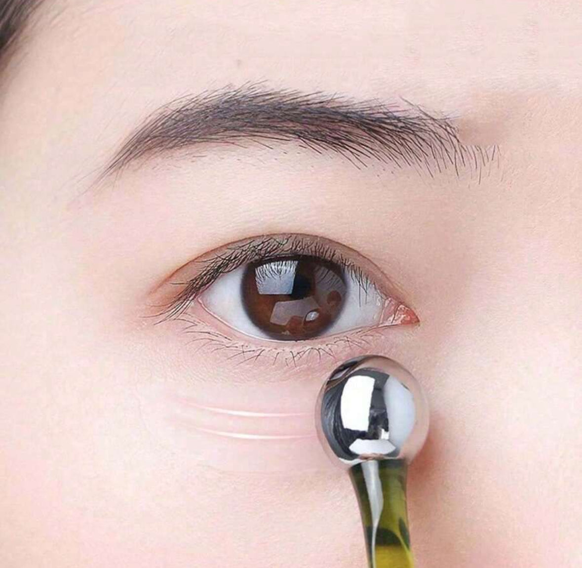 SILVER OLAY EYE ROLLER