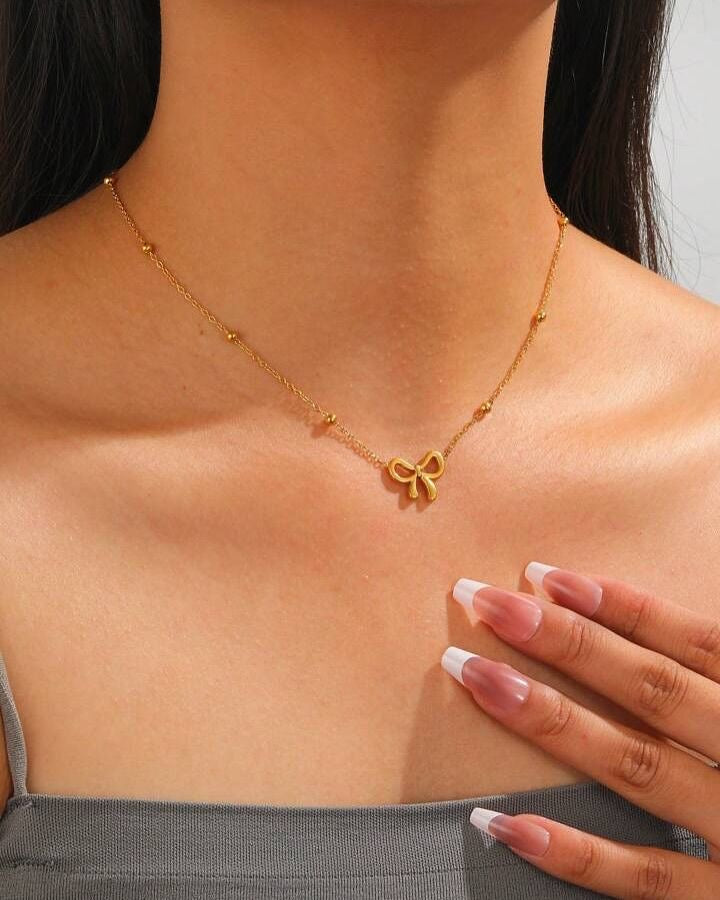 B117 BOW NECKLACE