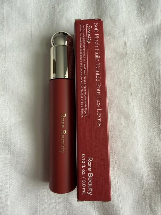 RARE BEAUTY LIP OIL IN SHADE SERENITY