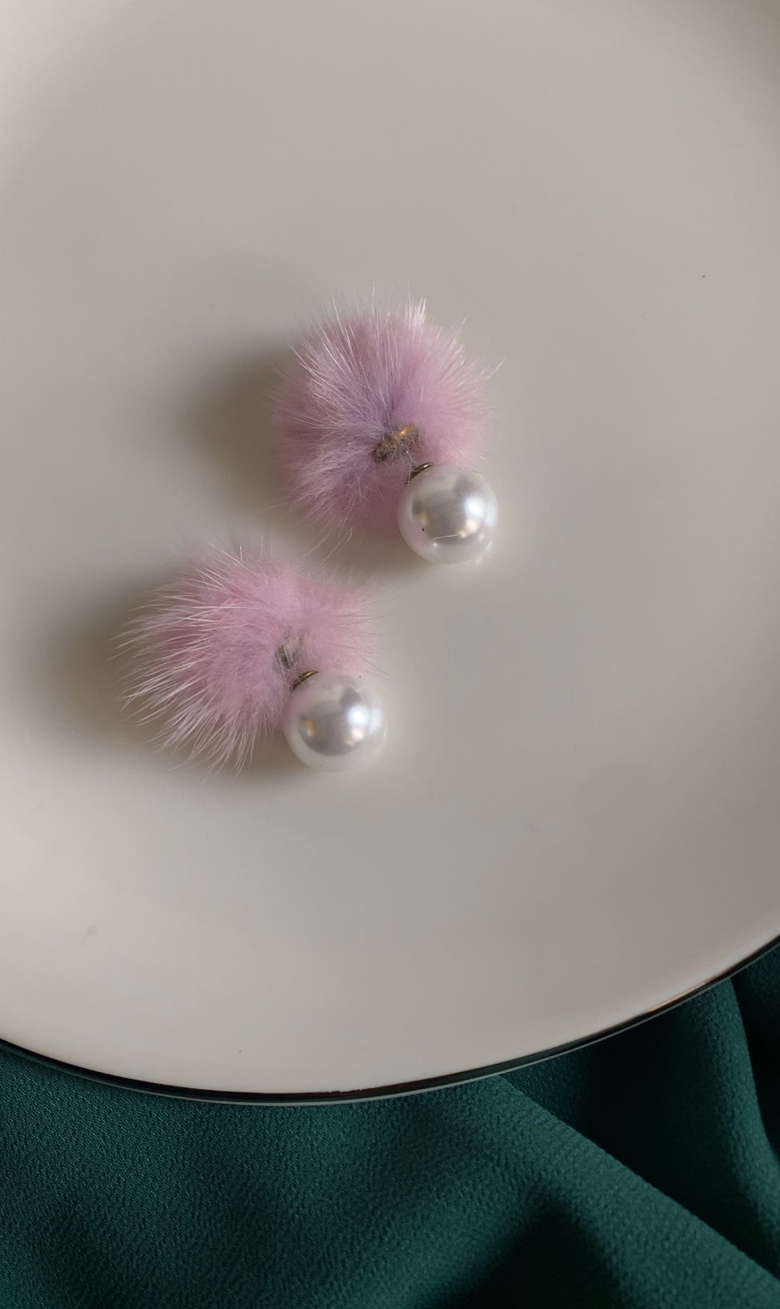 F PURPLE FUR EAR STUDS