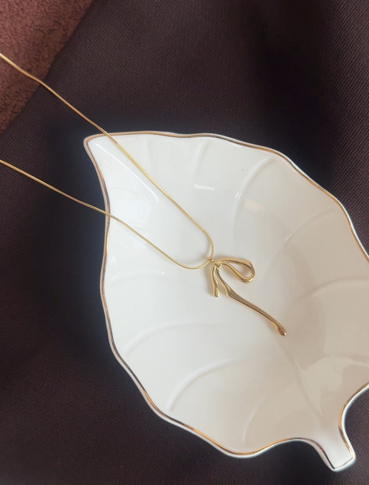 D6 BOW NECKLACE