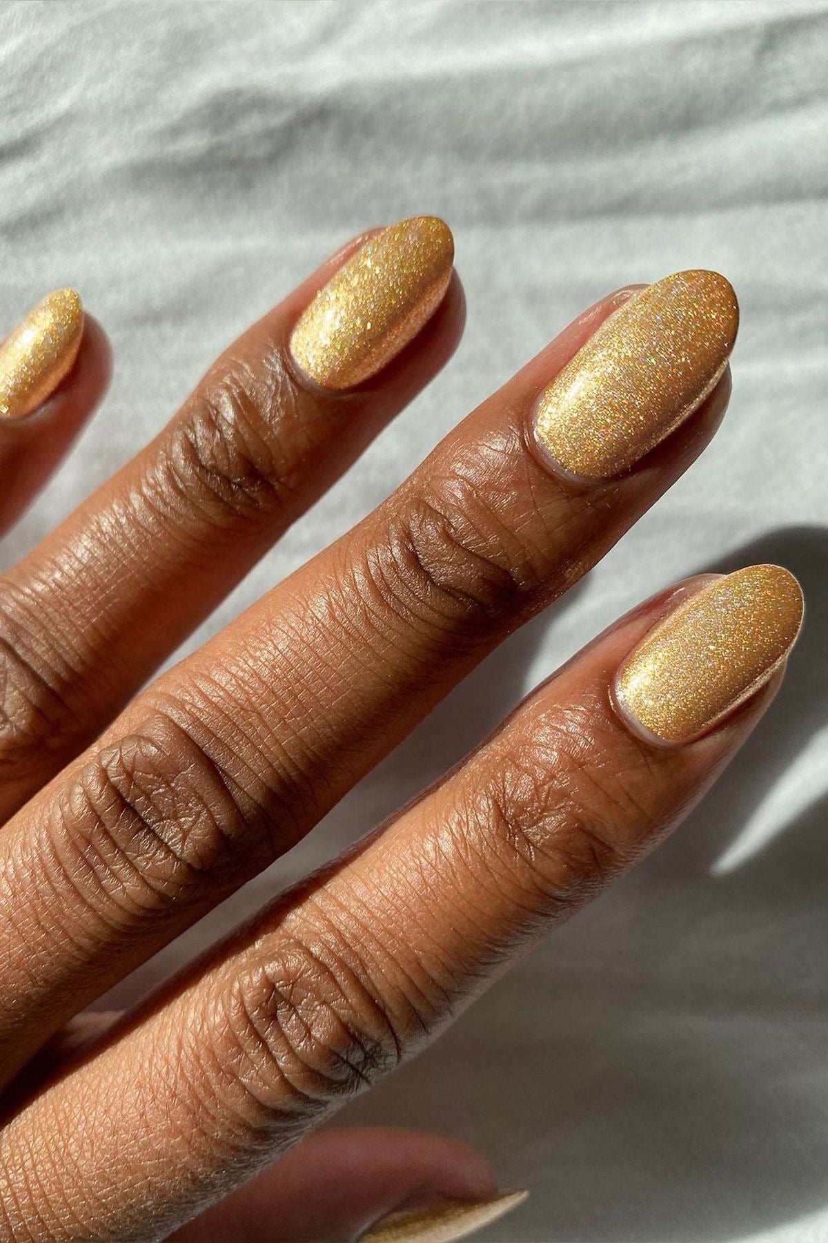 MINISO NAIL COLOR IN GLITTER YELLOW SHADE