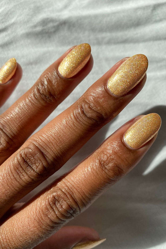 MINISO NAIL COLOR IN GLITTER YELLOW SHADE