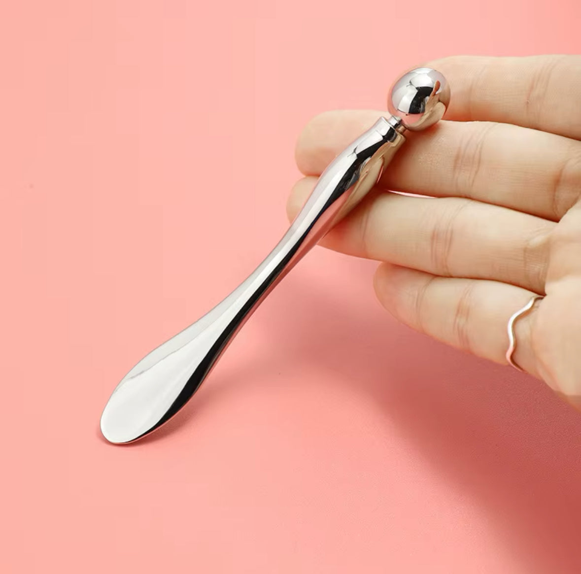 SILVER OLAY EYE ROLLER