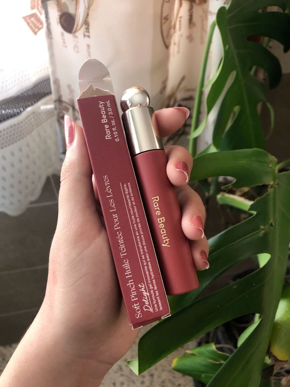 RARE BEAUTY LIP OIL IN SHADE SERENITY