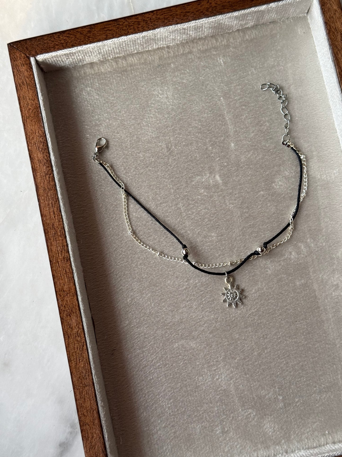 D142 ANKLET