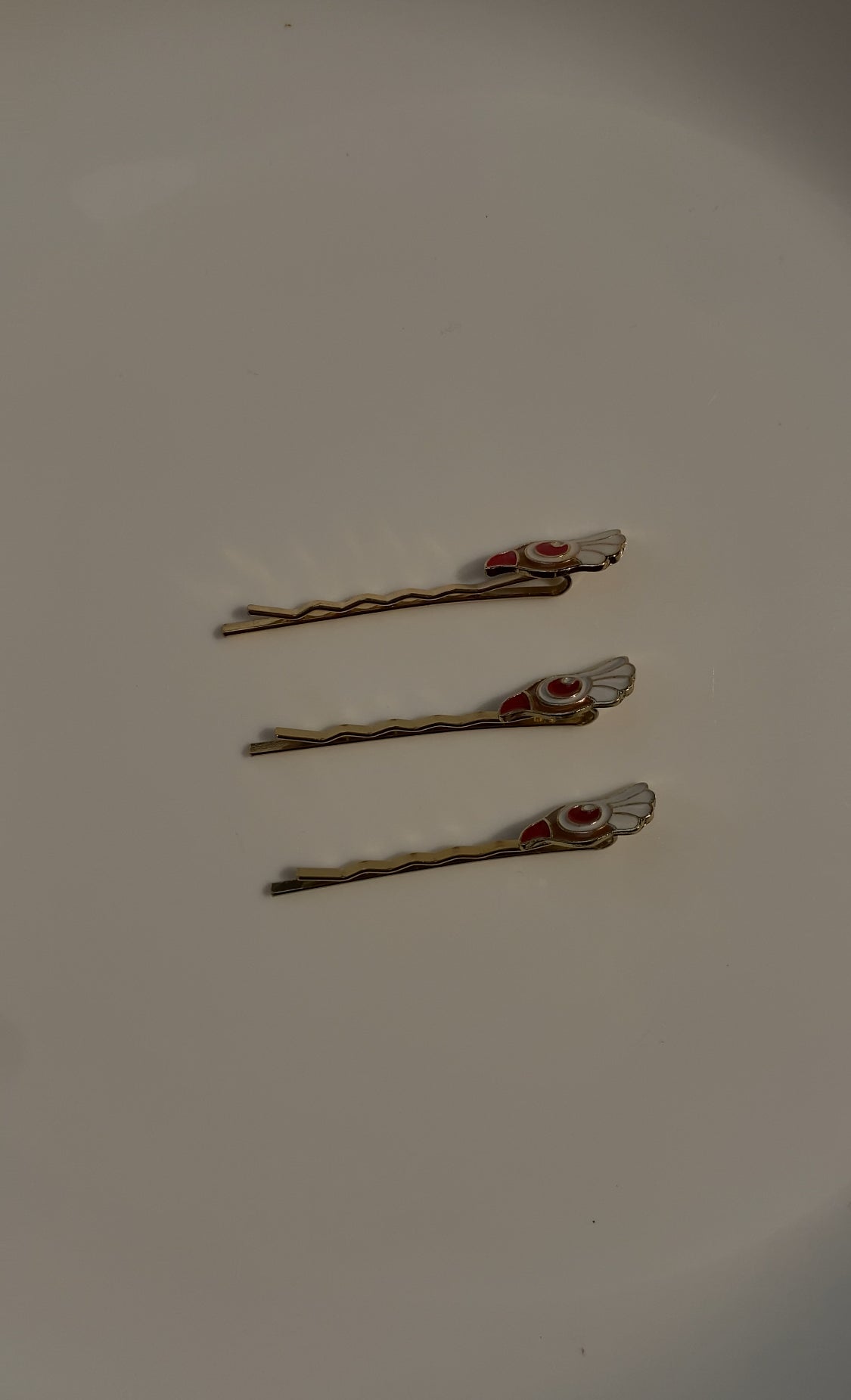 WHITE AND RED HAIR PIN