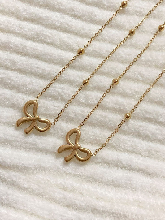 B117 BOW NECKLACE