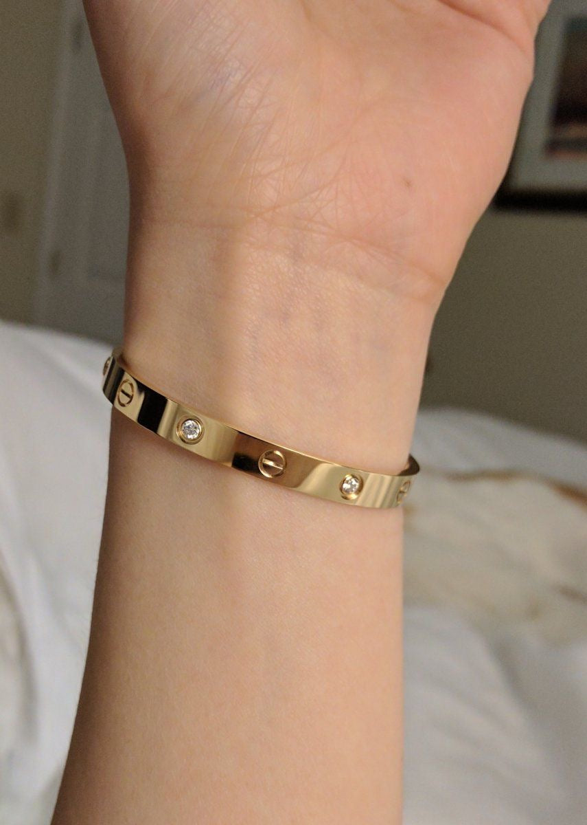 B120 CARTIER BANGLE WITH STONES